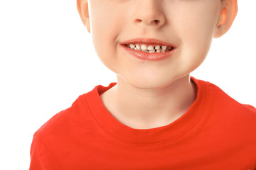 Happy smiling little boy on white background, closeup