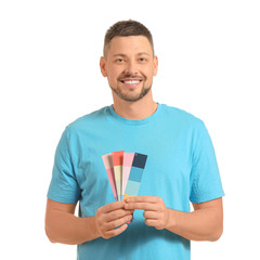 Man with color palettes on white background