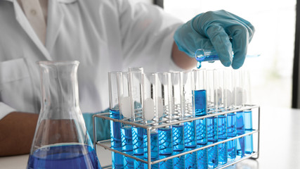 Female scientist are experimenting in the laboratory.