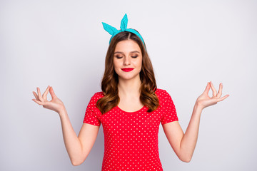 Portrait of positive quiet redhead girl show om symbol practice yoga exercise meditate close eyes...