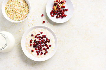Obraz na płótnie Canvas Pomegranate oats porridge
