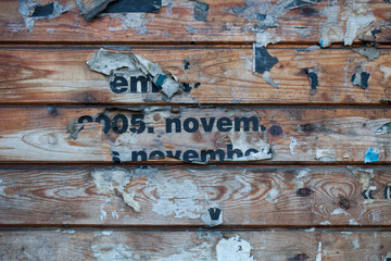 Old Wooden Wall With Poster Fragments