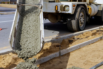 Cement mixer truck transport with pouring concrete.