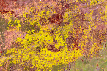 Old rusty metal painted with paint as an abstract background
