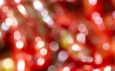 Festive red bokeh as an abstract background