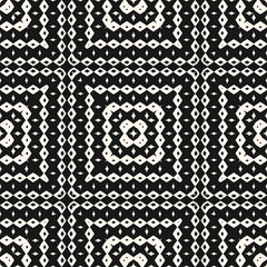 Vector ornamental seamless pattern with geometric elements, squares, rhombuses. Ethnic tribal background texture. Folk motif ornament.  Black and white design element for decor, textile, fabric, print