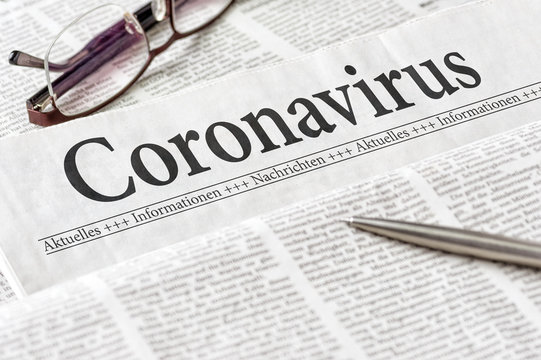Zeitung mit der Überschrift Coronavirus