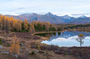 Beautiful autumn mountain lake and mountains
