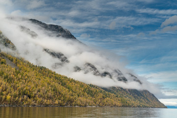 Beautiful autumn mountain lake and mountains
