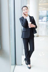 female staff standing in office