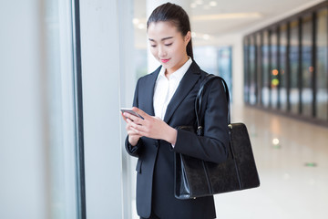 female staff standing in office