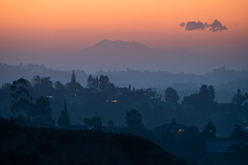 Los Angeles hills at sunrise, famous California city LA silhouette