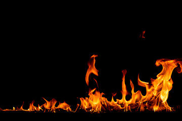 On fire flames at the black background
