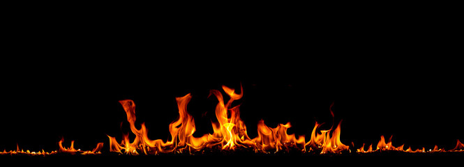 On fire flames at the black background