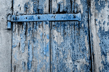 Old blue painted wooden door