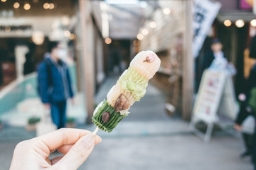 waiter with tray of wine in restaurant