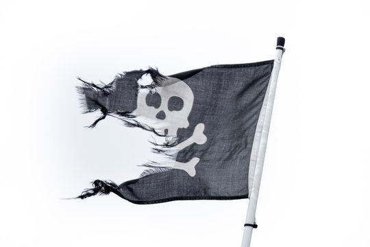 Black And White Waving Frayed Pirate Flag With A White Background