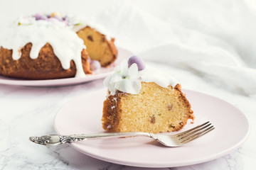 Glazed easter cake with flowers and candy