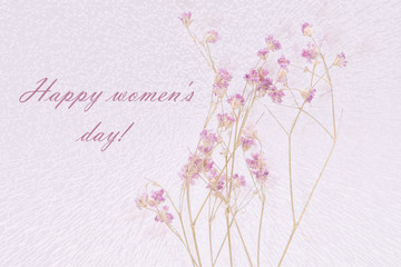 Pink flowers on the white pixel background with English text: Happy women´s day!