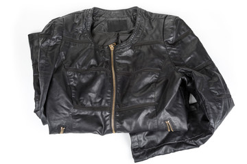 Woman leather black jacket with zip on a white