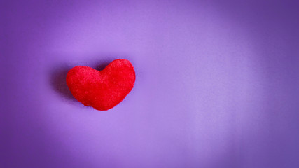 Fototapeta premium inspirational love concept - photo of red heart shaped on paper
