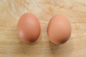 hen egg put on wood cutting board in kitchen prepare cooking
