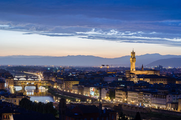 Fototapeta na wymiar Amazing view of Florence during sunset with Palazzo Vecchio tower in the background in Florence Italy
