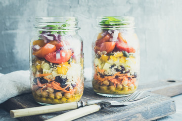 Fresh colorful salad in the jar