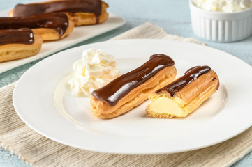 Eclairs with chocolate topping