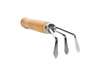 Small garden rake isolated on white background