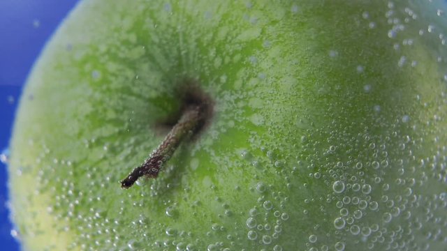 abstract macro image of a green apple close -up. selective focus