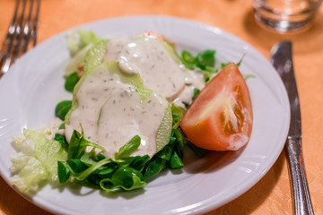 Fresh classic  caesar salad on dining table