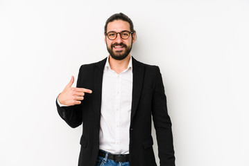 Young caucasian business man isolated on a white background person pointing by hand to a shirt copy space, proud and confident