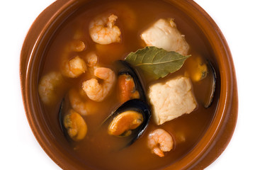 French bouillabaisse soup isolated on white background close up