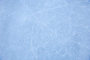 texture of ice skates traces on the blue ice