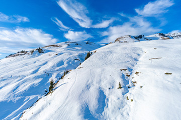 Fototapeta na wymiar Winter landscape on the First mountain in Swiss Alps in Grindelwald ski resort, Switzerland