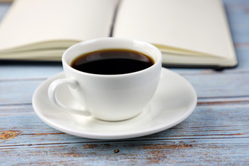cup of coffee on wooden table