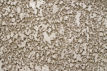 Background image of a wall with decorative plaster.