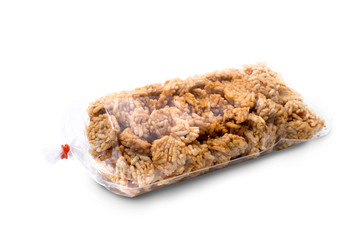 crispy rice crackers in transparency plastic bag - popular snack in Thailand