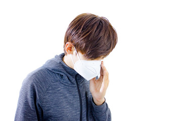 Asian man wearing mask to prevent virus and PM 2.5 dust isolate.