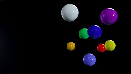 3D rendering flying bright balls of all colors on a black background.