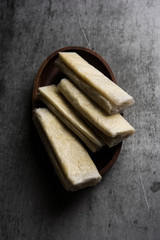 Pootharekulu  is a popular recipe originated from Andhra Pradesh, India.It is a paper-thin sweet or dessert made from rice start/gram flour, jaggery/sugar and clarified butter. Served in a plate.