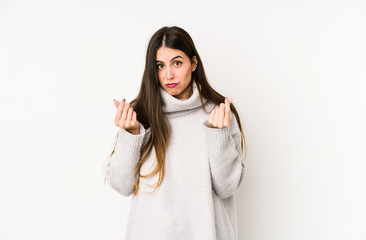 Young caucasian woman isolated on a white background showing that she has no money.