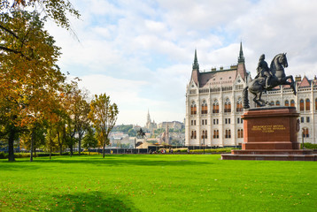 The equestrian statue of Ferenc Rakoczi II in Parliament Square outside the Parliament Building in Budapest Hungary with the Castle Hill in view