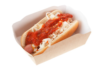 Hot dog with cabbage, mustard and tomato sauce isolated on white background.