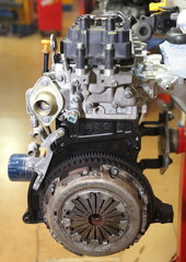 Endothermic engine of a modern car, seen from the clutch side, ready to be installed on board.