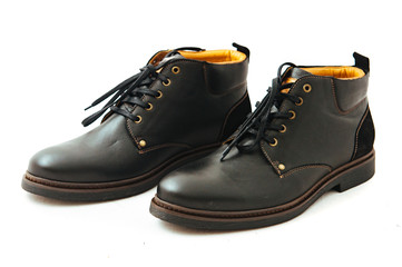 Pair of leather men's shoes isolated on white background