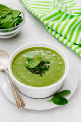 Creamy vegetable soup on bright table. Healthy detox food. Vegetarian food.