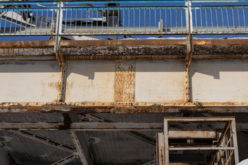 Steel bridge frame close. Bridge over the winter river
