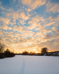winter sunset on a snowy river